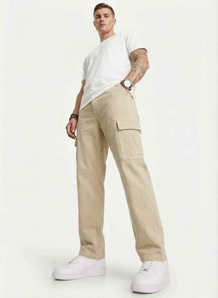 Redefine your everyday carry and comfort with the BREXX Urban Utility Beige Cargo Pants. Designed for the man who values both function and fashion, these trousers are the ultimate addition to a versatile wardrobe. Whether you are navigating the urban jungle or heading out for a casual weekend, the structured design ensures you look sharp without compromising on comfort. Key Features & Benefits: Premium Cotton Twill: Crafted from high-grade, breathable cotton fabric that offers superior durability and a soft hand-feel. Multi-Functional Storage: Equipped with deep side cargo pockets with secure flap closures, perfect for phones, wallets, and keys, plus standard front and back pockets. Modern Tapered Fit: expertly tailored to provide a relaxed feel at the thighs while tapering neatly at the ankles for a clean, contemporary silhouette. Reinforced Construction: Features heavy-duty stitching on belt loops and stress points to ensure longevity. Versatile Styling: The neutral beige tone pairs effortlessly with t-shirts, hoodies, or button-downs for year-round wear. Upgrade your rotation with the pants that work as hard as you do. Experience the perfect blend of tactical utility and street-ready style with BREXX
