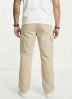 Redefine your everyday carry and comfort with the BREXX Urban Utility Beige Cargo Pants. Designed for the man who values both function and fashion, these trousers are the ultimate addition to a versatile wardrobe. Whether you are navigating the urban jungle or heading out for a casual weekend, the structured design ensures you look sharp without compromising on comfort. Key Features & Benefits: Premium Cotton Twill: Crafted from high-grade, breathable cotton fabric that offers superior durability and a soft hand-feel. Multi-Functional Storage: Equipped with deep side cargo pockets with secure flap closures, perfect for phones, wallets, and keys, plus standard front and back pockets. Modern Tapered Fit: expertly tailored to provide a relaxed feel at the thighs while tapering neatly at the ankles for a clean, contemporary silhouette. Reinforced Construction: Features heavy-duty stitching on belt loops and stress points to ensure longevity. Versatile Styling: The neutral beige tone pairs effortlessly with t-shirts, hoodies, or button-downs for year-round wear. Upgrade your rotation with the pants that work as hard as you do. Experience the perfect blend of tactical utility and street-ready style with BREXX